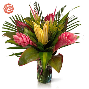 Green, pink & yellow tropical bouquet in vase with (2) Ginger Pink, (1) Ginger Red, (2) Chili Pink Picks, (2) Anglonema, (2) Arrow Palm, (6) Cordelyne, (1) Croton Tip Fountain, (2) Masajeana, (2) Pandanus,. 