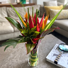 Tropical Joy Bouquet in vase on table